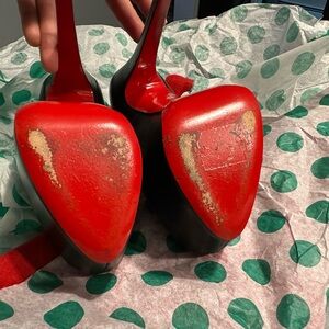 Christian Louboutin Red and Black Shoe Accents